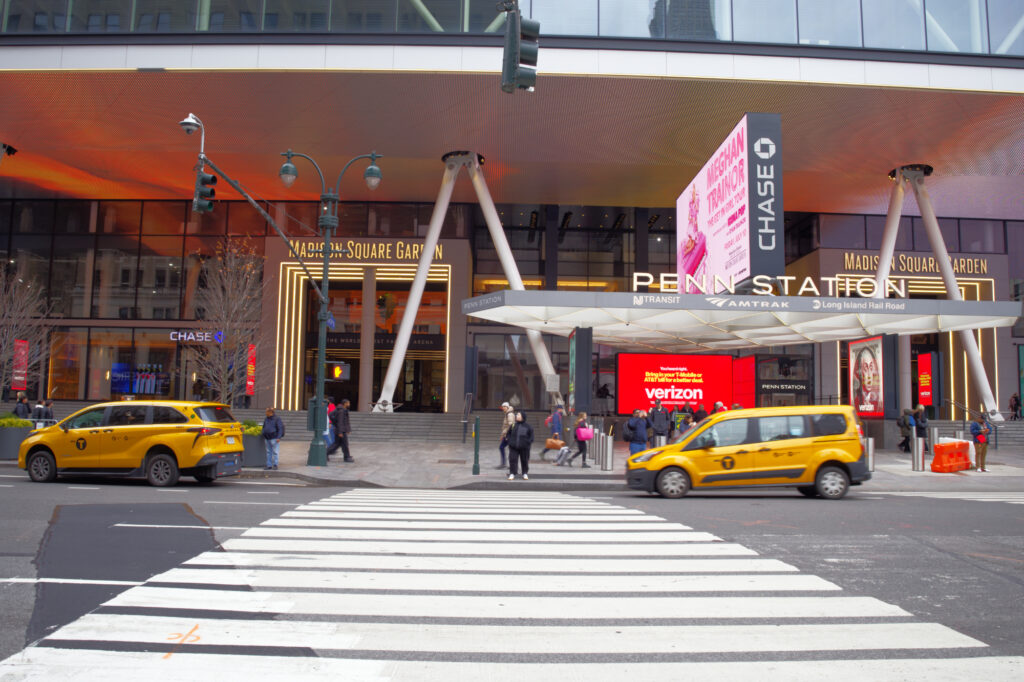 Madison Square Gardens entrance alongside that of Penn Station.